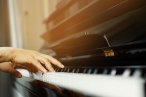 close up of hand people man musician playing piano keyboard with selective  focus keys. can be used as a background. 11345583 Stock Photo at Vecteezy